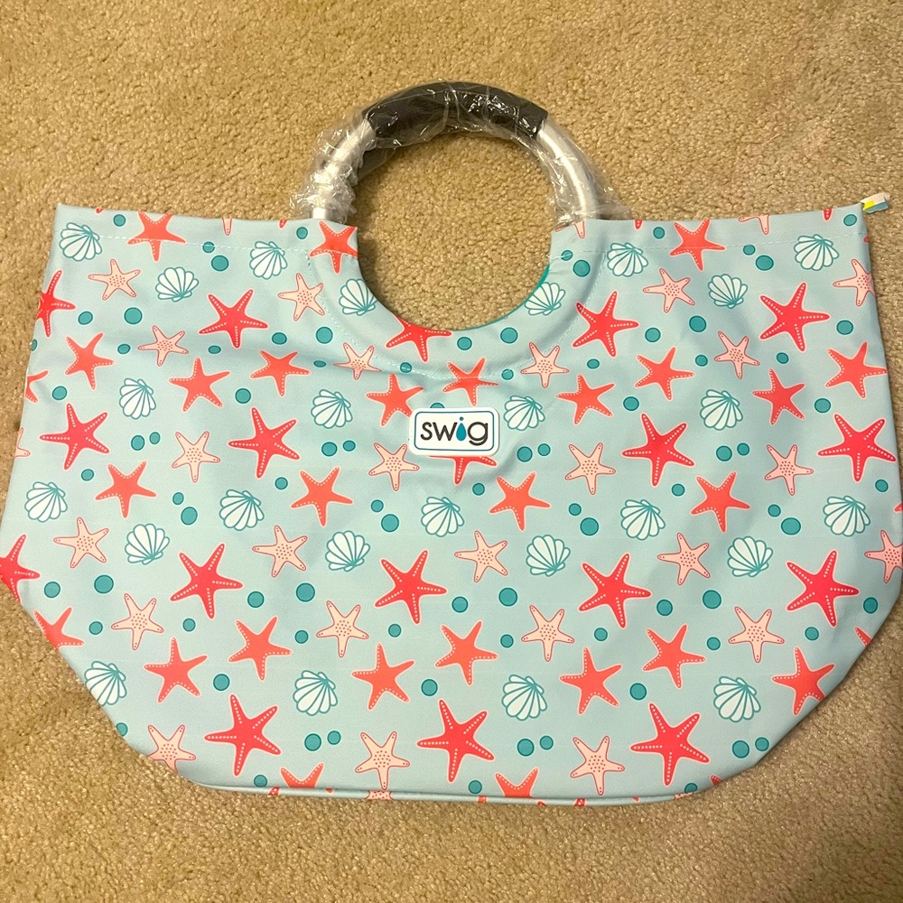 NWOT Swig Loopi Tote/pool bag. 16in wide,15in tall, 11in deep. Waterproof.